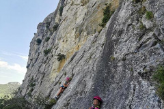 Not quite Honnold on Thank God ledge of Half Dome, just two girls on shady side of Dentelles de Montmirail