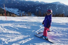 skiing on her own above Lungau